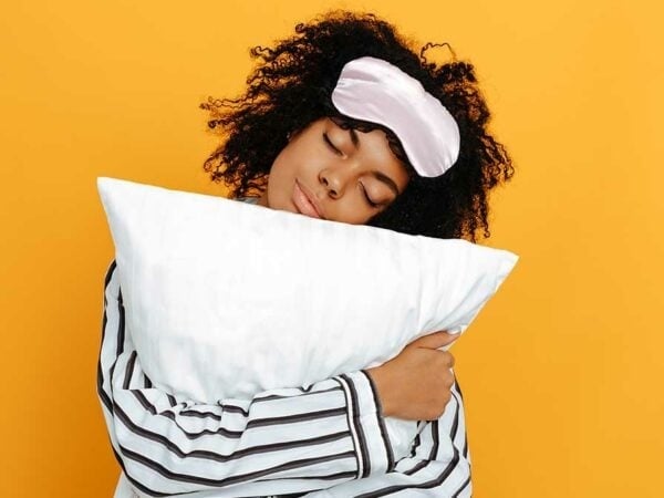 Woman holding pillow